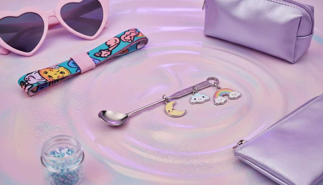 Pastel ravecore flatlay featuring a bump straw for powder styled with charms and festival accessories
