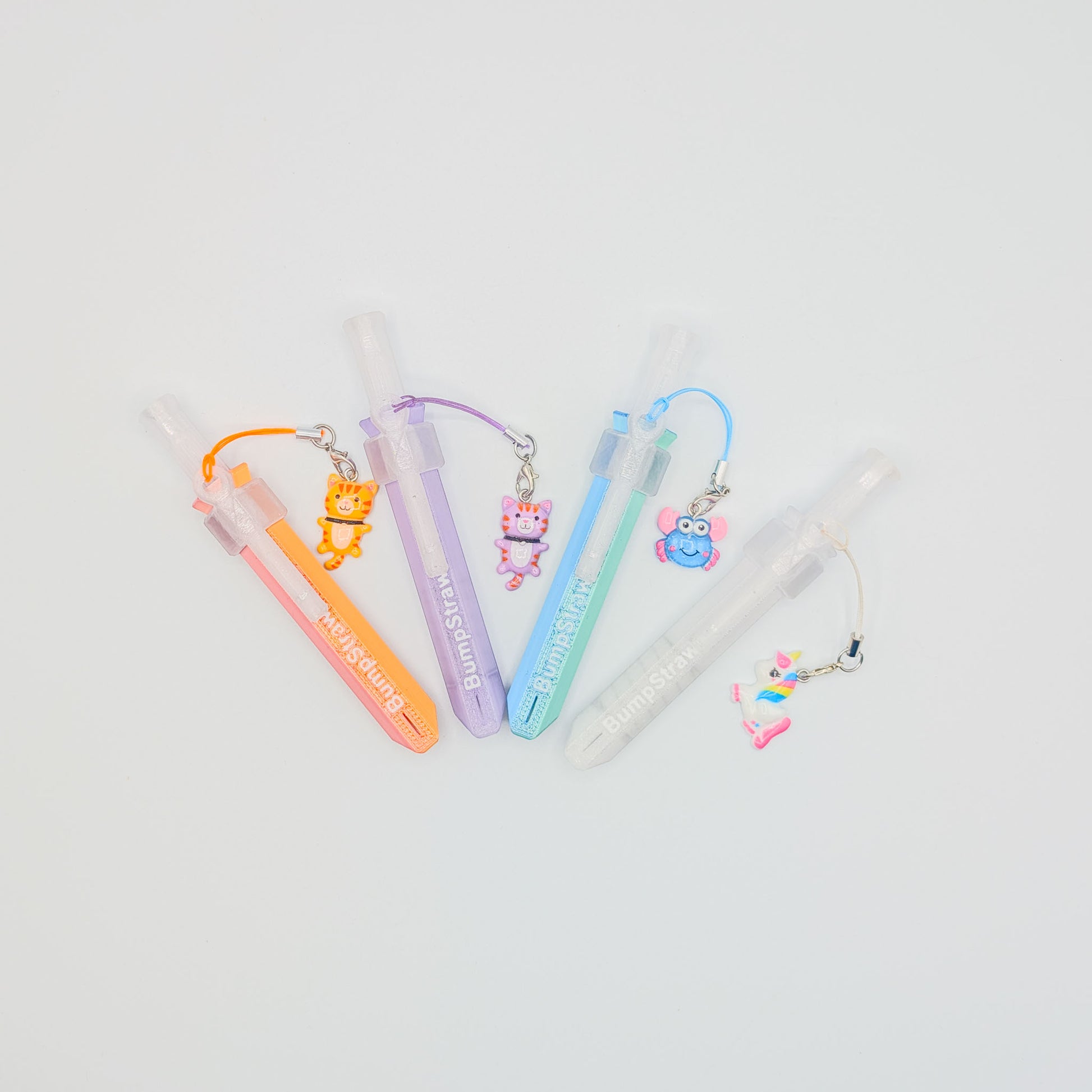 BumpStraw bundle set of powder spoons with charms, includes orange, purple, blue, and clear bump straws for cacao and powders