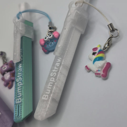 Video of BumpStraw bundle set of powder spoons with charms in purple, orange, blue, clear for cacao and powders