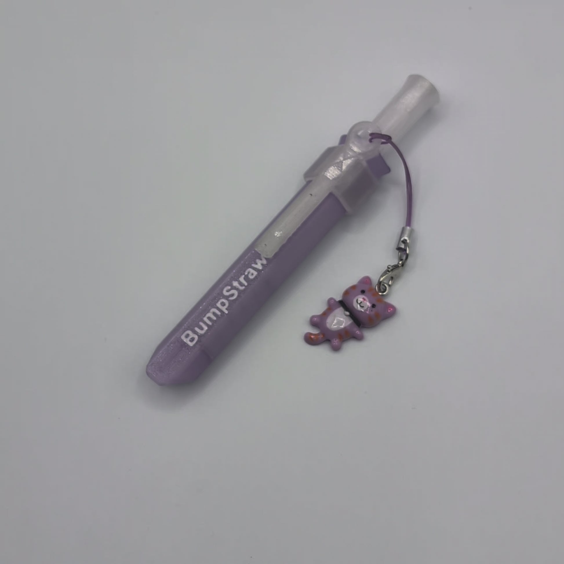 Video of purple BumpStraw powder spoon with cat charm for cacao and powders