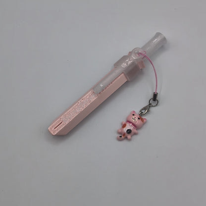 Video of pink BumpStraw powder spoon bump straw with cat charm for cacao and powders