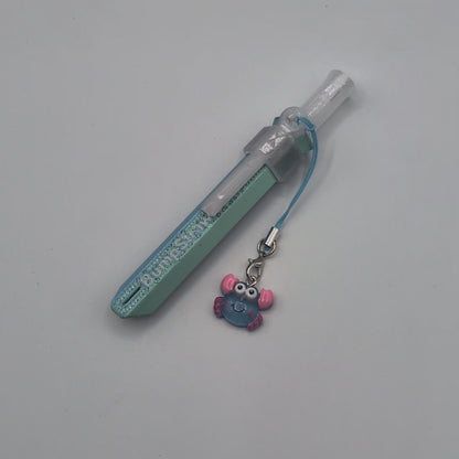 Video of blue BumpStraw powder spoon bump straw with crab charm, ideal for cacao