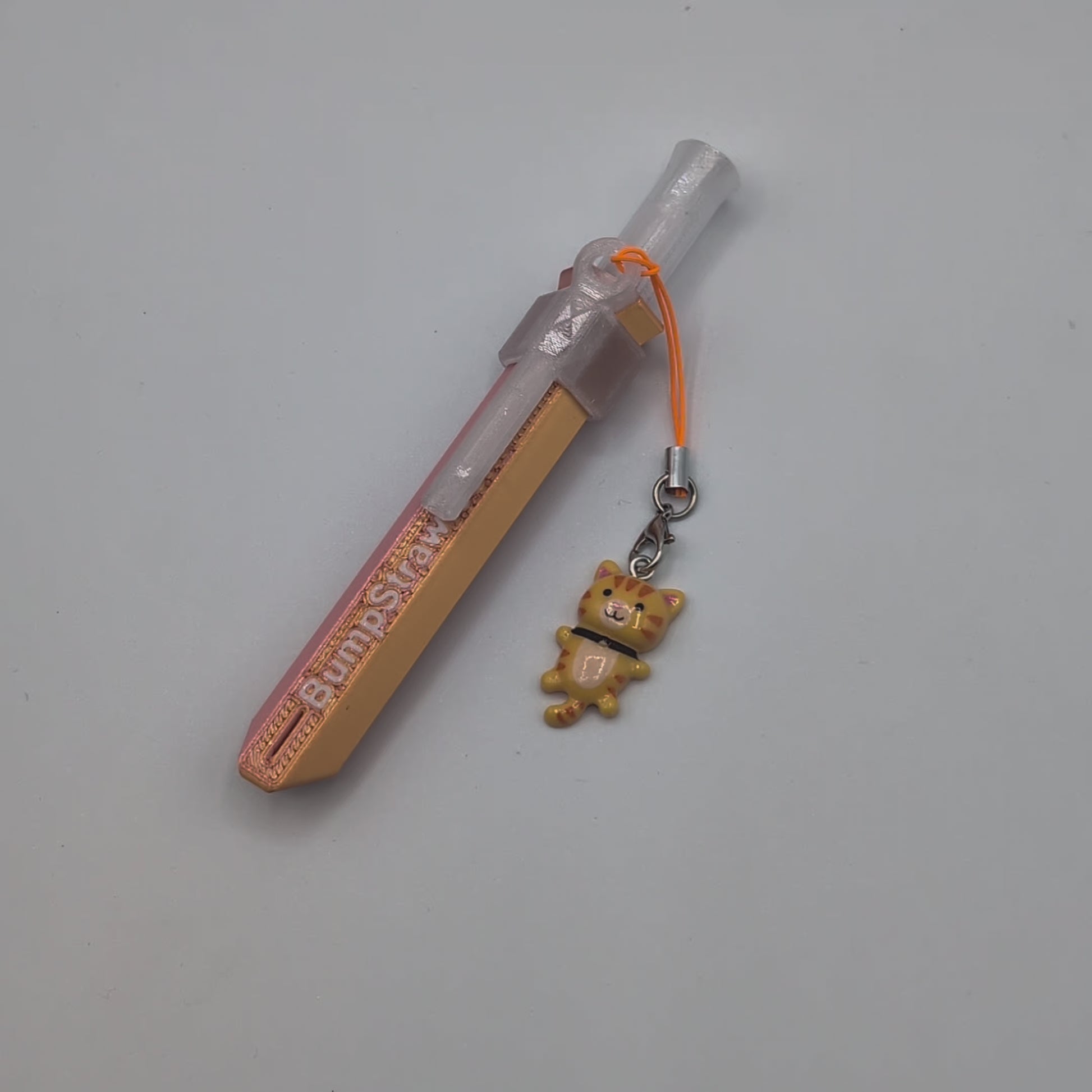 Video of orange BumpStraw bump straw powder spoon with tiger charm for cacao